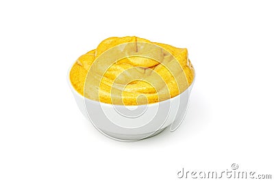 Yellow mustard sauce in white ceramic bowl isolated on white background. Stock Photo