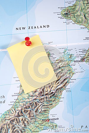 Yellow Note and red pin on map Stock Photo