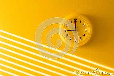 Yellow office clock Stock Photo