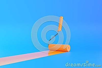 Yellow Paint Roller with color trail over blue background Stock Photo
