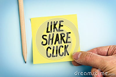 Yellow Paper Note With Words Like Share Click Stock Photo