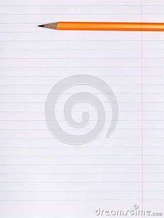 Orange pencil lies on a sheet of paper notebook with lines of inclination. The concept of education Stock Photo