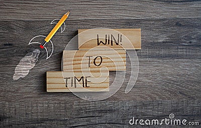 Yellow pencil rocket and ladder with business message Time to win Stock Photo