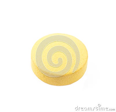 Yellow pill isolated on white Stock Photo