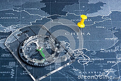 Yellow pin and compass on the world map pin to China countries.Business world wide system concept. Stock Photo
