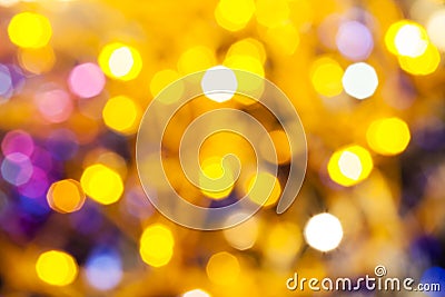 Yellow pink blurred shimmering Christmas lights Stock Photo