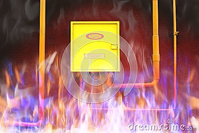 Yellow pipes of the gas pipeline entering the wall of the building burn with a flame of fire Stock Photo