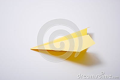 Yellow plane origami Stock Photo