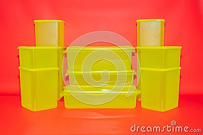 Yellow Plastic Box Jars in Various Sizes: Versatile Storage Solutions Stock Photo