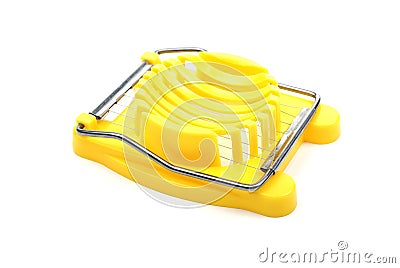 Yellow plastic egg cutter. Stock Photo