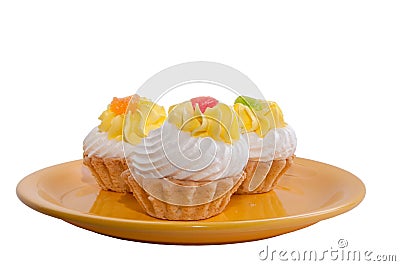 Yellow plate with pastry cream Stock Photo