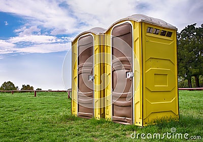 Yellow portable toilets Stock Photo