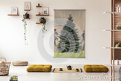 Yellow poufs on the floor in japanese dining room interior with Stock Photo