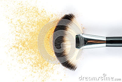 Yellow Powder Eyeshadow on a Brush, fashion beauty Stock Photo