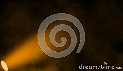 Yellow projector. Spotlight stage with smoke on background. Design element Stock Photo