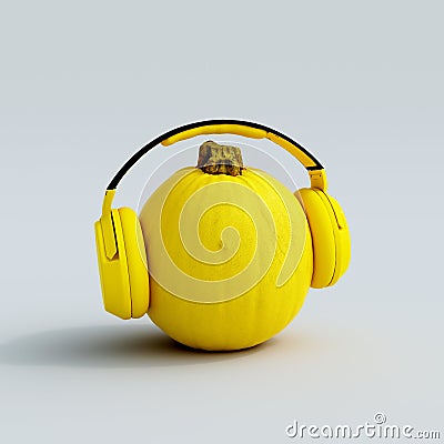 Yellow pumpkin with headphones on gray background Stock Photo