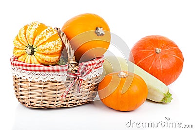 Yellow pumpkins vegetables in basket Stock Photo