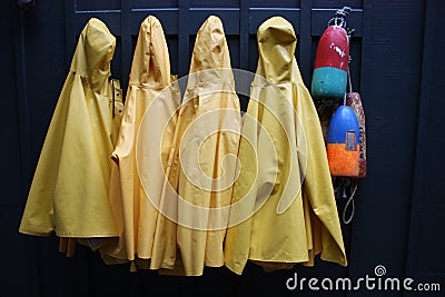 Yellow rain coats Stock Photo