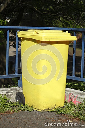 Yellow Recycling Bin Stock Photo