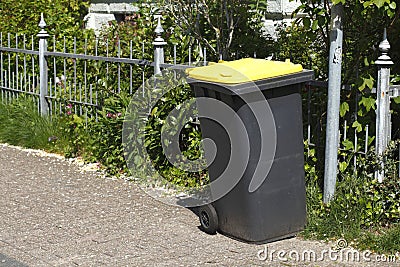 Yellow Recycling Bin Stock Photo