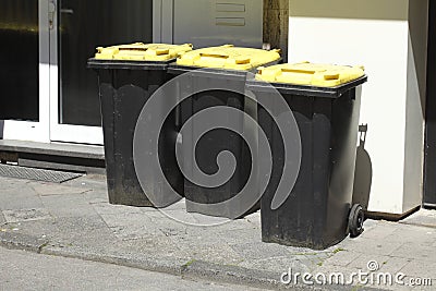 Yellow Recycling Bins Stock Photo