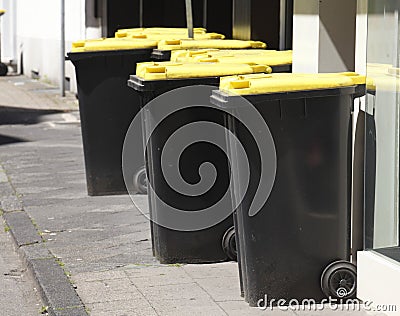 Yellow Recycling Bins Stock Photo