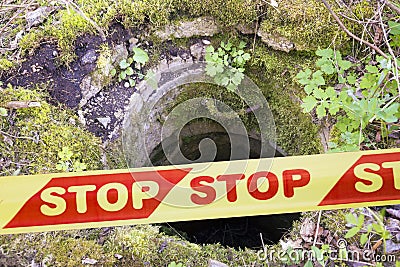 Yellow and red plastic caution or restriction tape Stock Photo