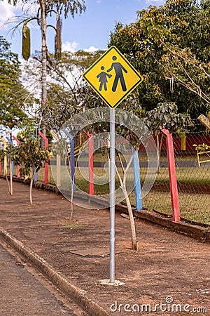 yellow road sign warning school attention Editorial Stock Photo