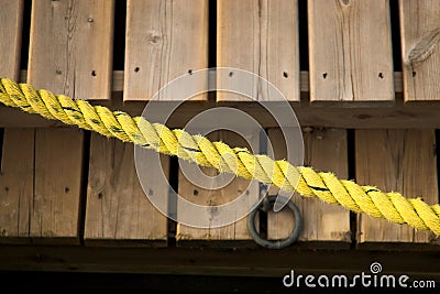 Yellow rope over docks Stock Photo