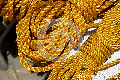 Yellow rope in piles on the market. Stock Photo