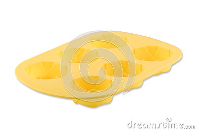 Yellow rose silicone cupcake or muffin form isolated on white background. Cake cup, silicone mold, bakeware. Stock Photo