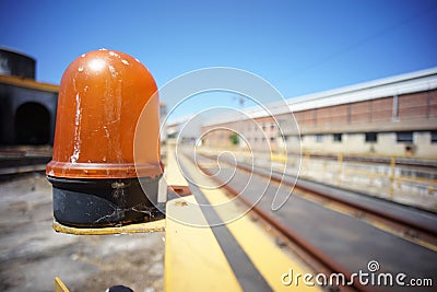 yellow rotating indicator light for moving machines on the left side. Stock Photo