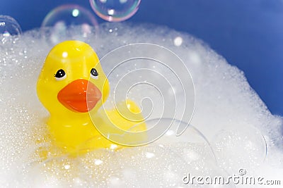 Yellow Rubber Duck in Bath Stock Photo