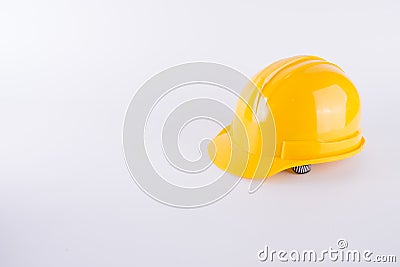 Yellow safety helmet on white background. Hard hat isolated on white. Safety equipment concept. Worker and Industrial theme Stock Photo