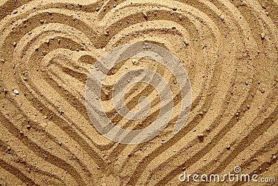 Yellow sand texture (heart) Stock Photo
