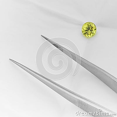 Round Yellow Sapphire on White Background Stock Photo