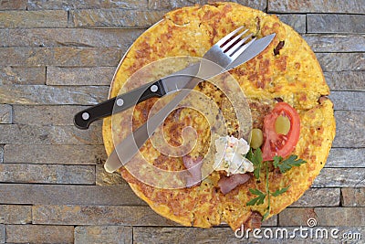 Yellow scrambled eggs knife and fork Stock Photo