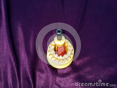 Yellow screwdriver stand isolated on violet background Stock Photo