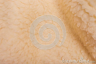 Yellow sheep material wool fur soft structure fleece fabric background texture warm natural nature skin Stock Photo