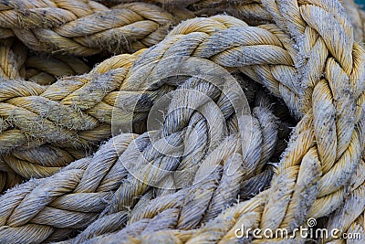 Closeup of Thick Faded Cargo Shipping Rope Stock Photo
