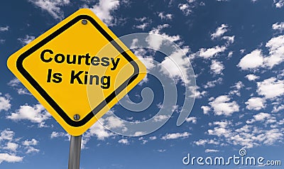 Courtesy is king sign Stock Photo