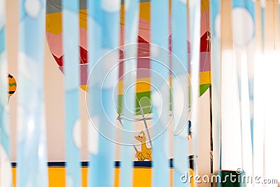 Yellow smiling duck flying on a hot air balloon Stock Photo