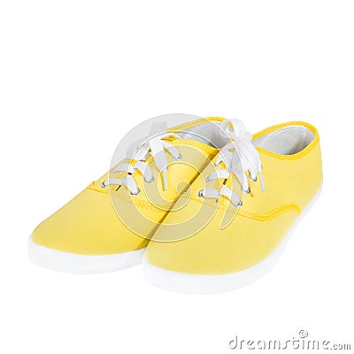 Yellow sneakers isolated on white background Stock Photo