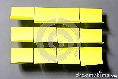 Yellow stickers on the grey background Stock Photo