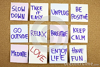 A yellow sticky note writing, caption, inscription Slow down, take ir easy be positive go outside relax breathe keep Stock Photo