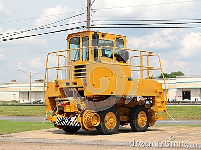 Yellow Street Spraying Construction Equipment Stock Photo