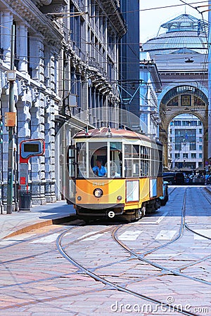 yellow streetcar in the streets of milan city in italy Editorial Stock Photo