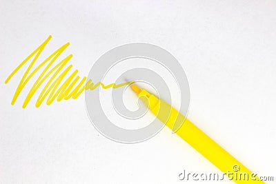 A yellow stroke on white paper from a felt-tip pen Stock Photo