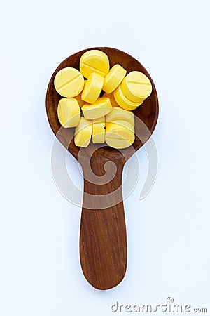 Yellow tablets of Paracetamol on white Stock Photo