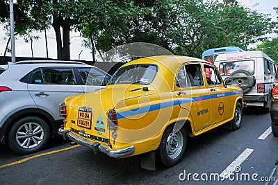 Yellow taxi on the road, Kolkata, India Editorial Stock Photo